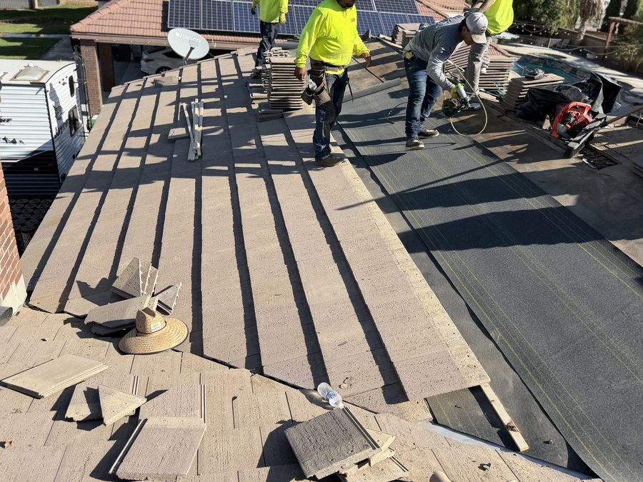 Crew installing concrete tile